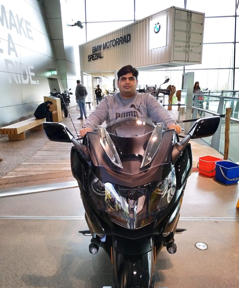 Vishwa Ranjan seated on a BMW Motorrad touring motorcycle